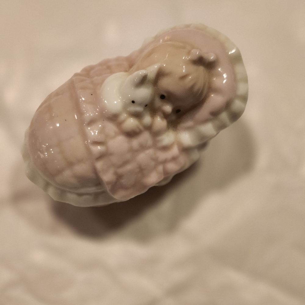 Porcelain baby girl keepsake box .